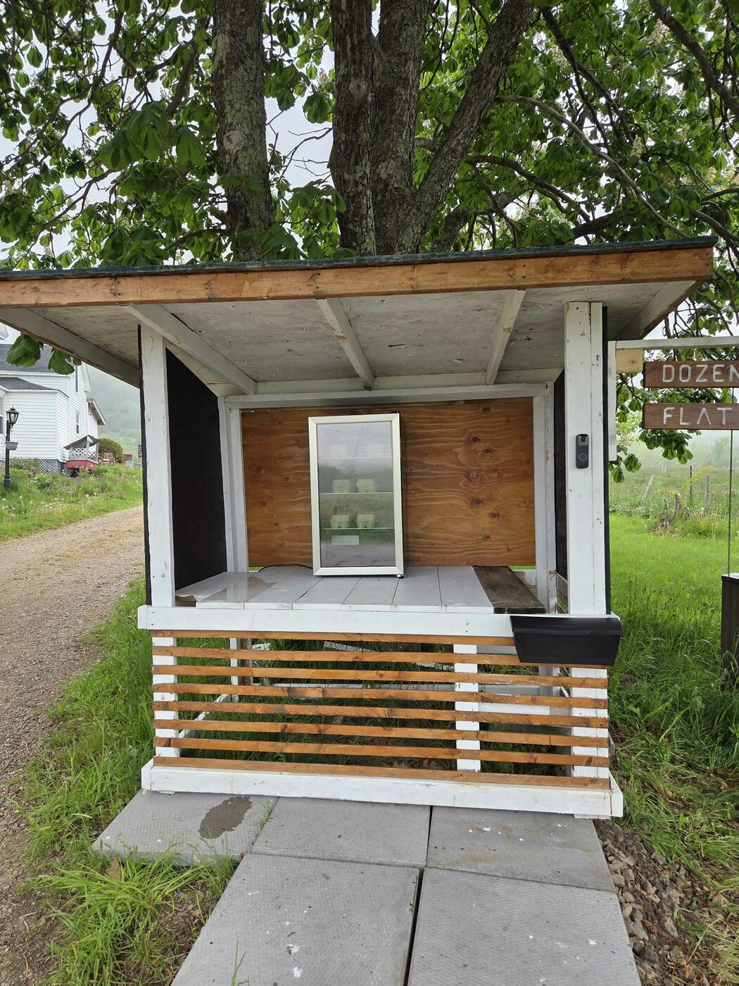 The MacGregor Valley Farm roadside stand with self-serve egg fridge